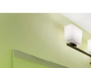 Bathroom with lighting, sink, cabinets, toilet, and shower tub